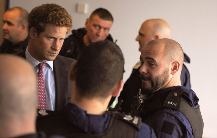 Image: Prince Harry Meets Emergency Services Crews On Duty During The Riots